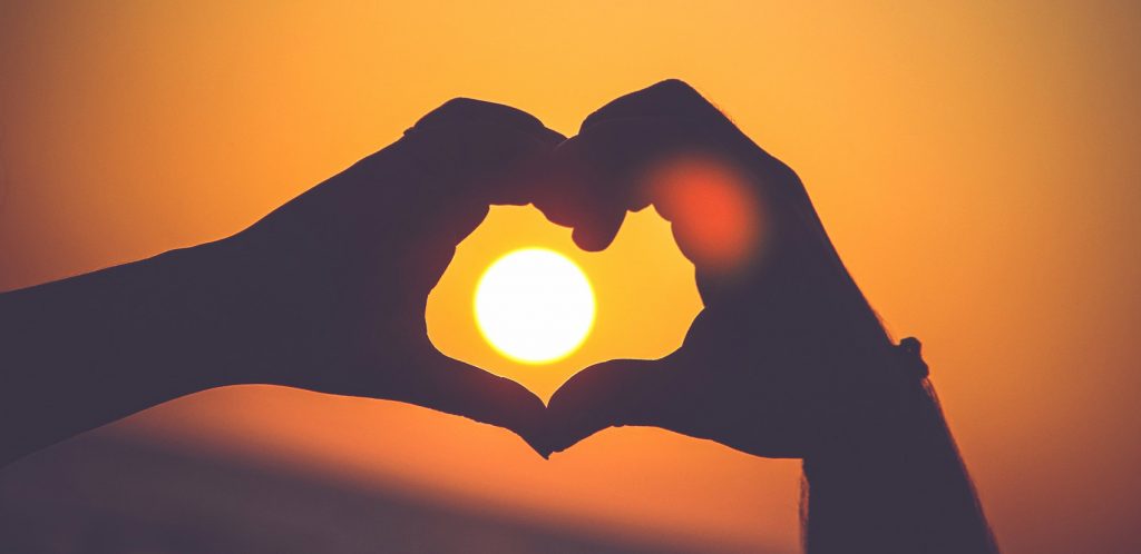 Picture of hand showing the sun