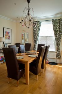 Cosy, comfortable dining room in executive accommodation.