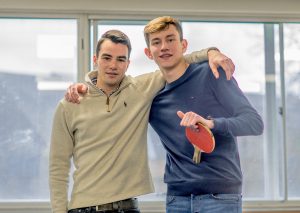 LSI/IH Portsmouth students playing ping-pong together