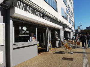 A closer photo of cafe 113 from the street