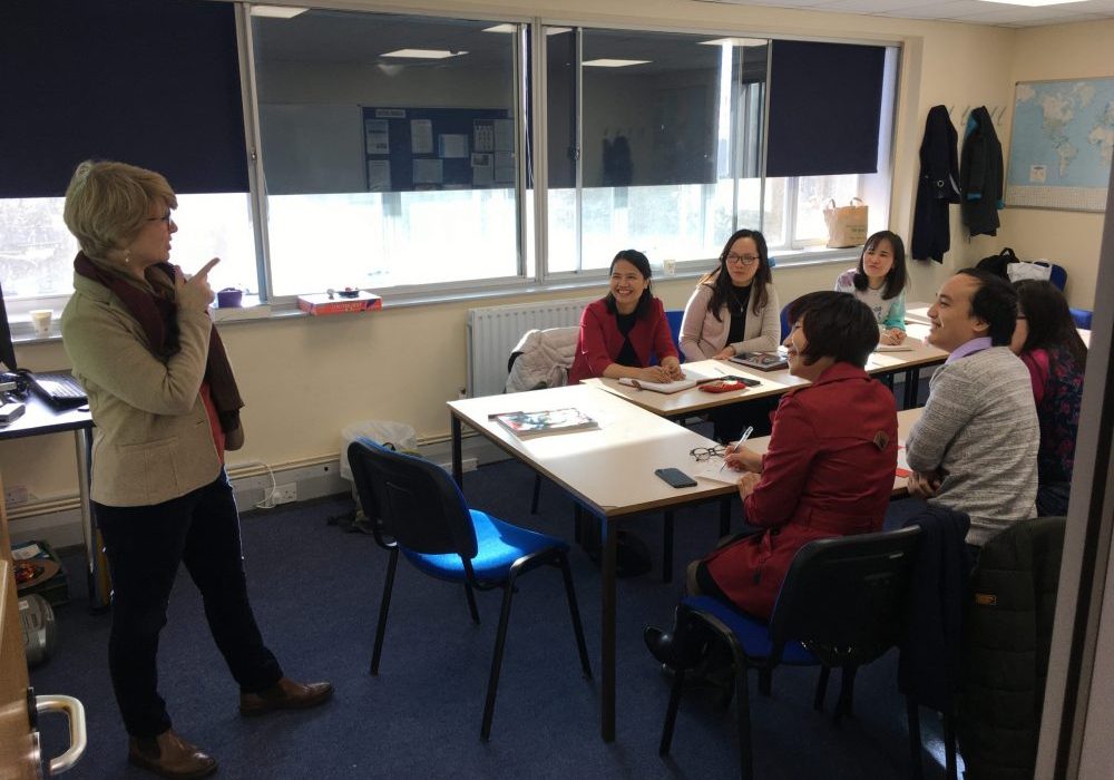 students from Vietnam work hard on English language course